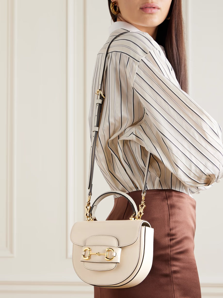 1955 horsebit-embellished textured-leather shoulder bag 0424061403